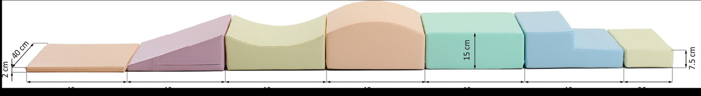 Flat lay view of pastel foam blocks with height and width dimensions marked