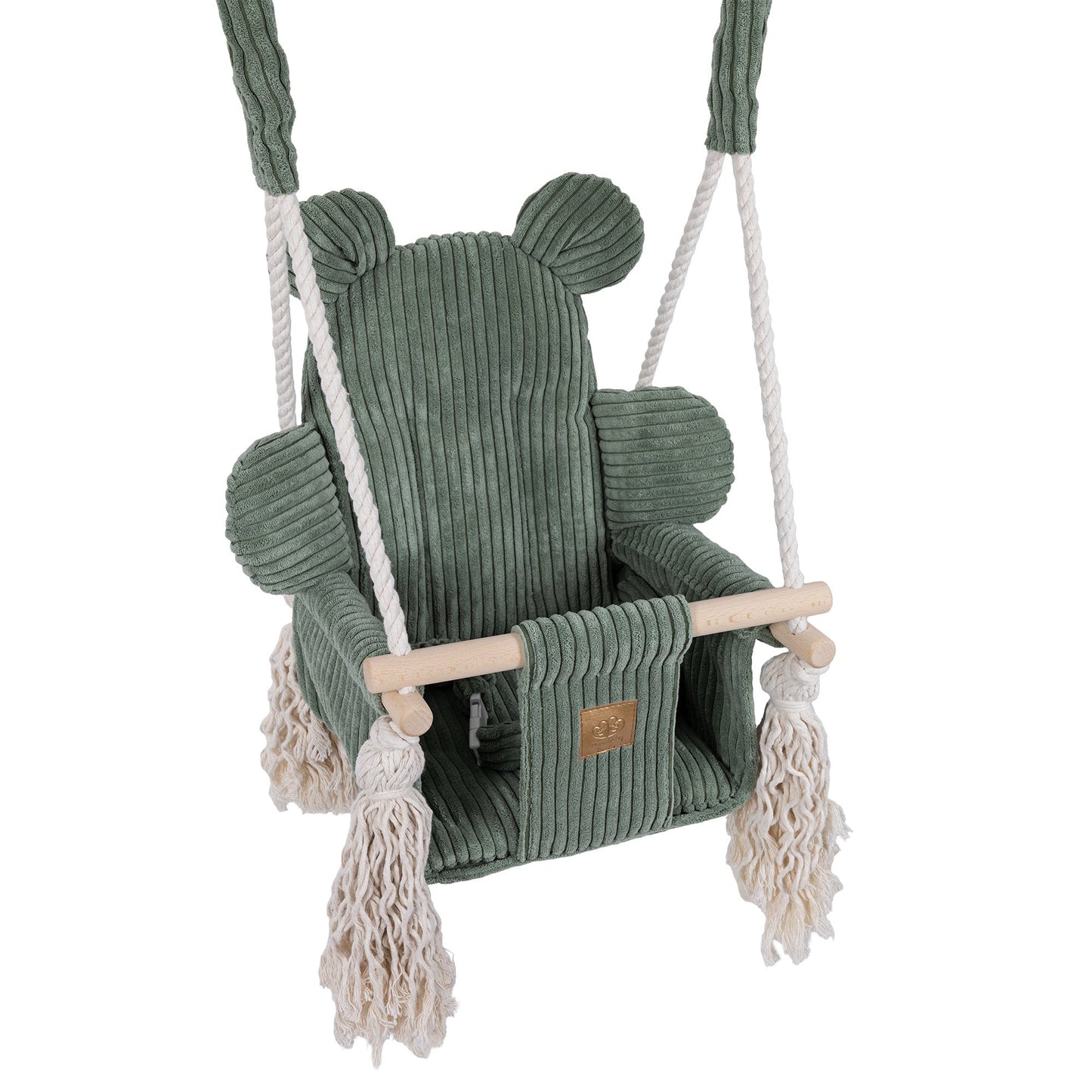 Olive green baby swing hanging from rope with fringe detail and wooden bar, angled view