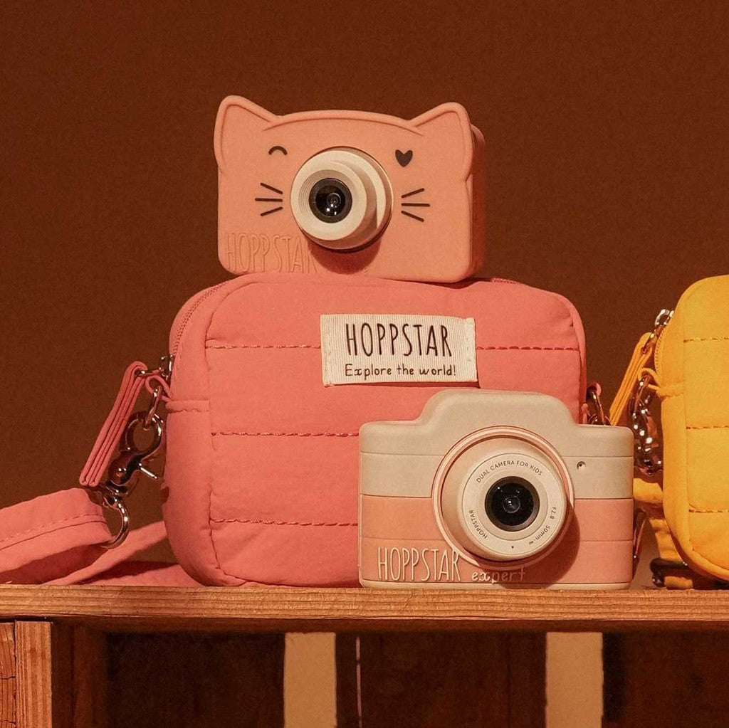 Hoppstar Expert Blush camera with a coral Hoppstar camera bag