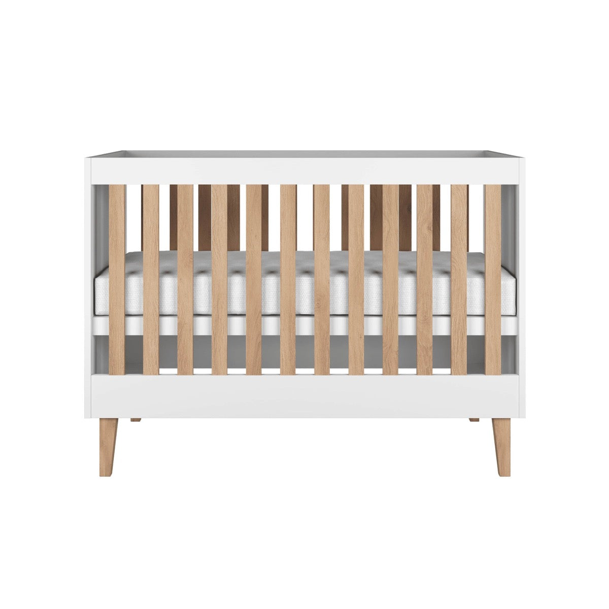 Kocot Kids Baby Bed Kubi White Scandinavian Crib – front view white wooden cot with oak legs | Nestling