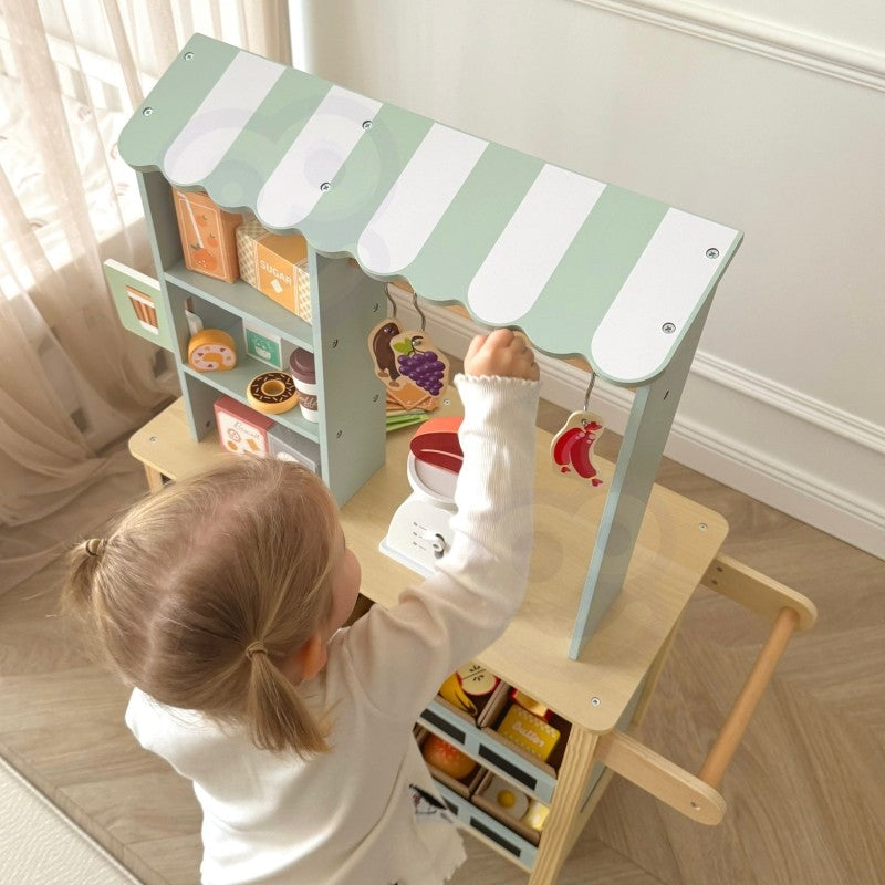 Top shelf of wooden food truck stand with sugar, coffee, and biscuit packaging
