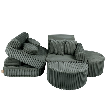 Modular forest green sofa pieces displayed separately showing customizable configuration options
