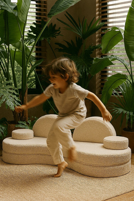MeowBaby Modular Sofa Coccolo 6-Piece Kids Foam Sofa – child climbing on bearly off-white coccolo sofa | Nestling