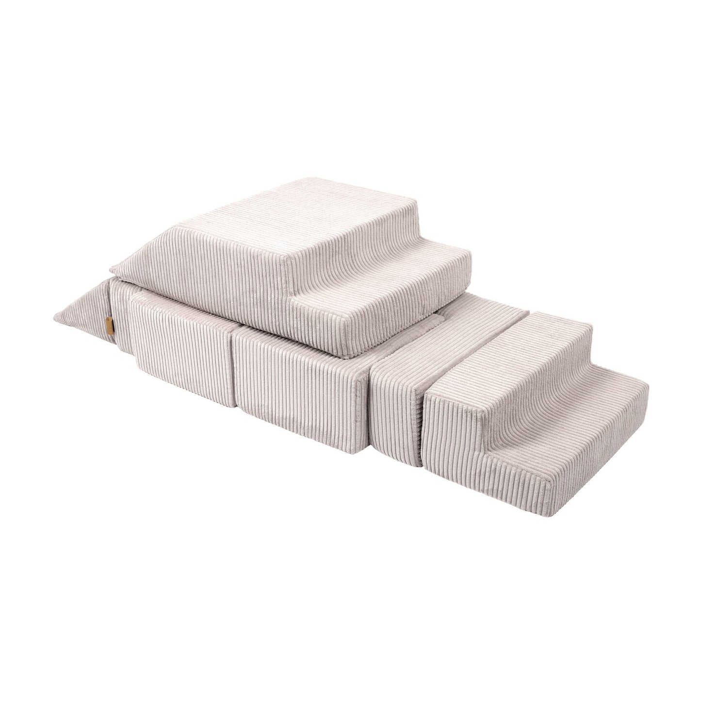 Soft velvet bricks stacked to form a playground structure with multiple levels and stairs