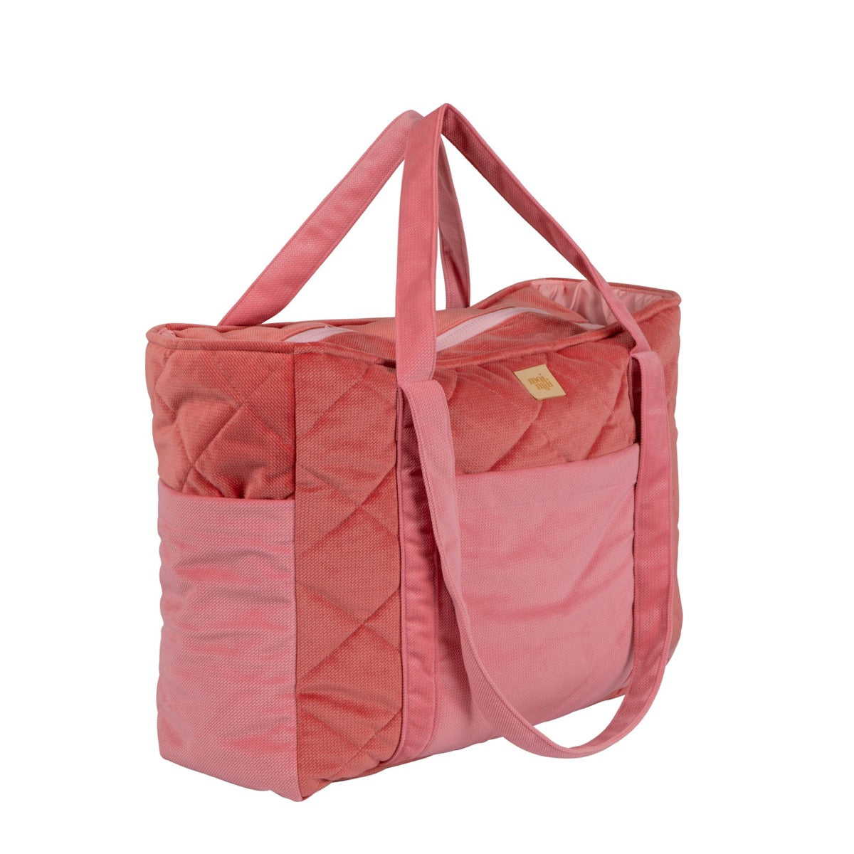 Candy pink mom bag with side pockets displayed from angled view showing structured shape