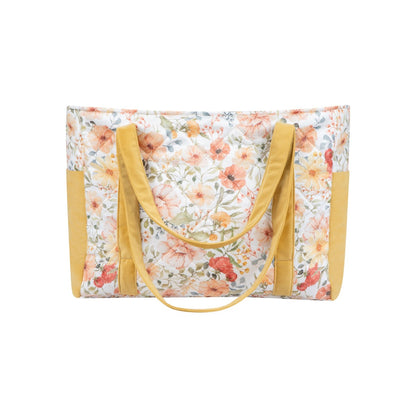 Flower Power weekender bag with floral cotton print and mustard yellow velvet handles, front view