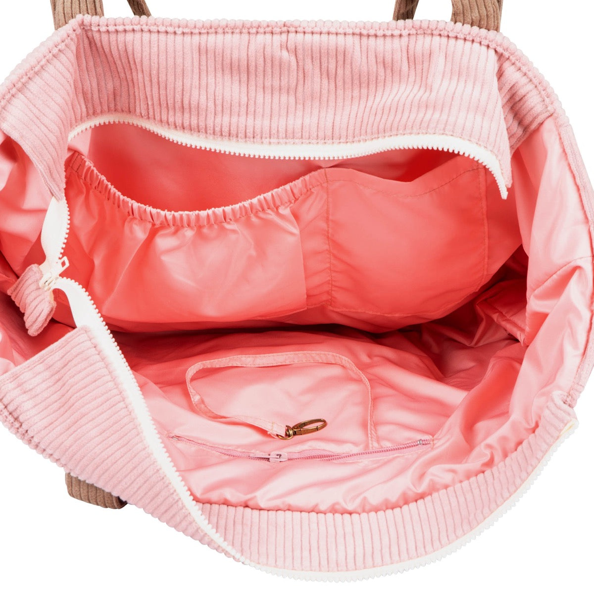 Interior view of pink coffee weekender bag showing waterproof lining and pockets