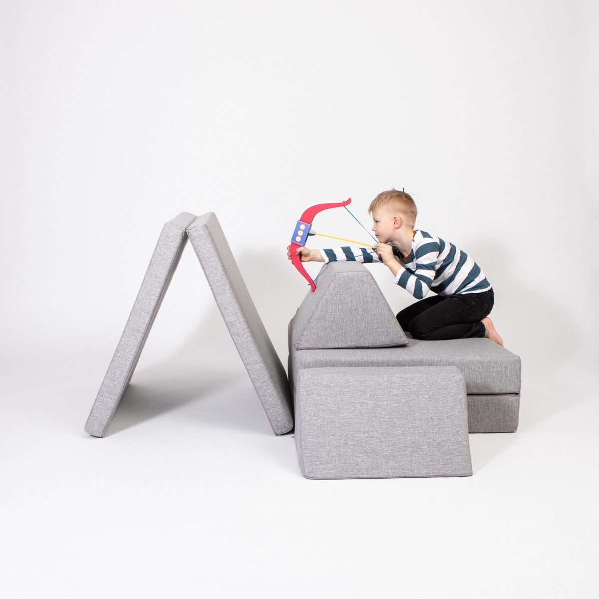 Monboxy Activity Play Mattress Set Grey Foam Sofa – baby lying on flat foam mattress | Nestling