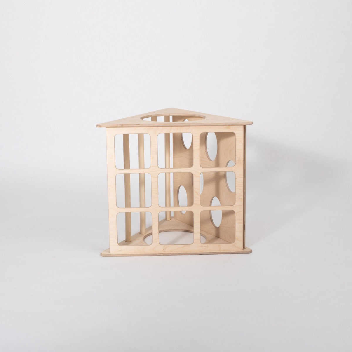 Wooden climbing triangle viewed from side showing internal shelf structure