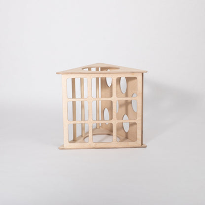 Wooden climbing triangle viewed from side showing internal shelf structure