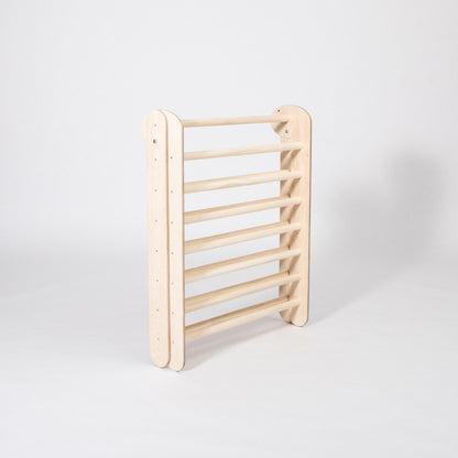 Folded climbing triangle ladder showing compact storage position