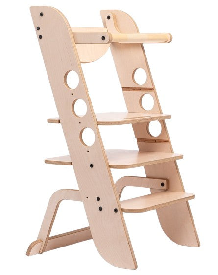 Luula Louis birch wood learning tower in natural finish, front view showing adjustable seat and climbing structure