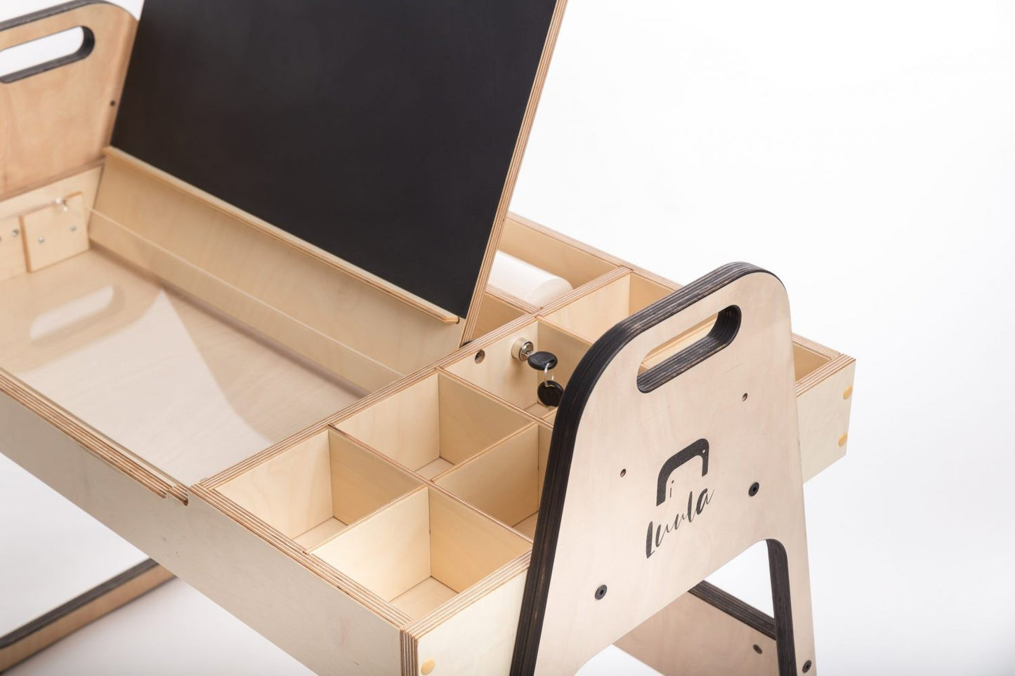 Birch wood art table interior showing divided storage compartments and tilting chalkboard