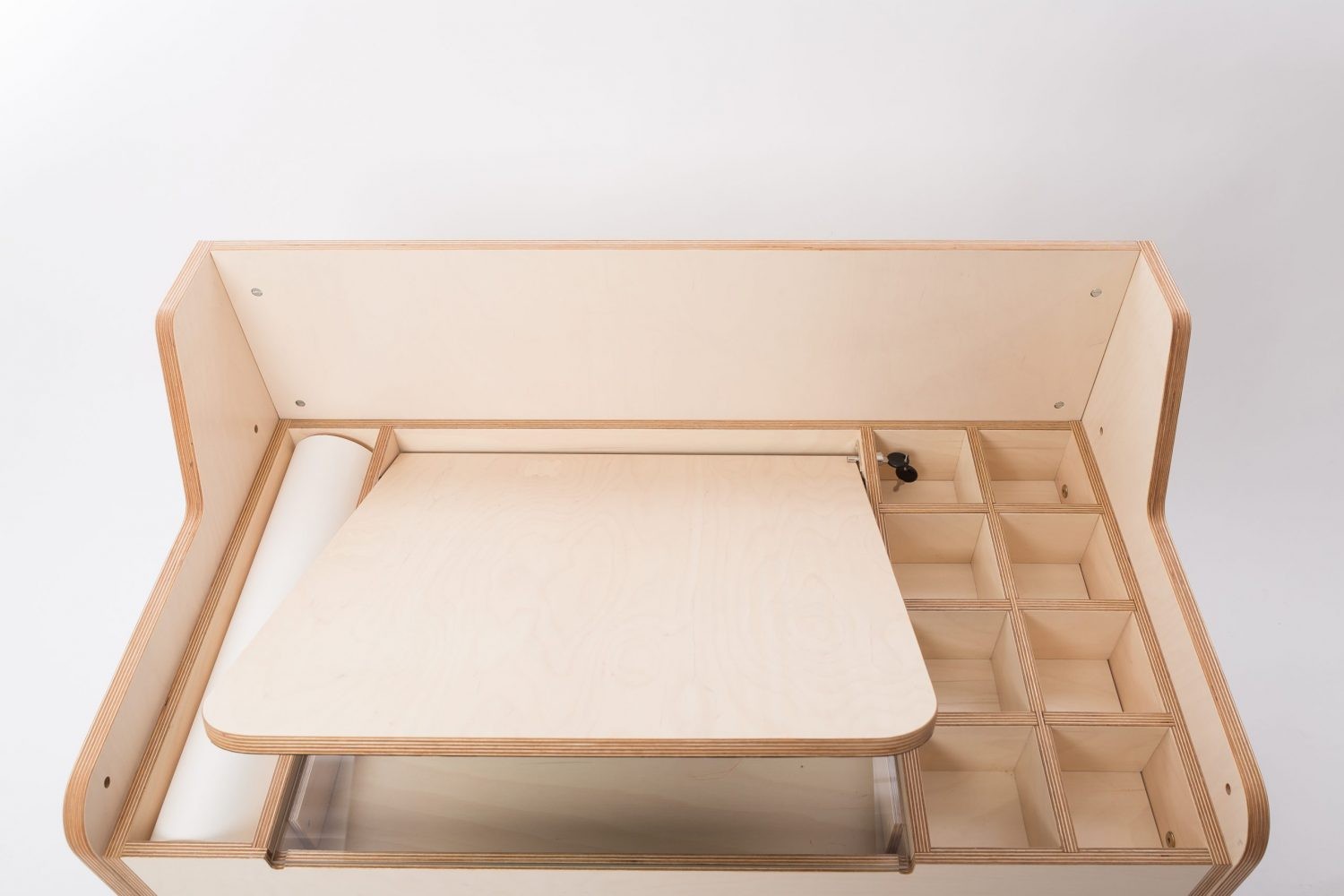 Overhead view of Luula table top with divided storage sections and easel