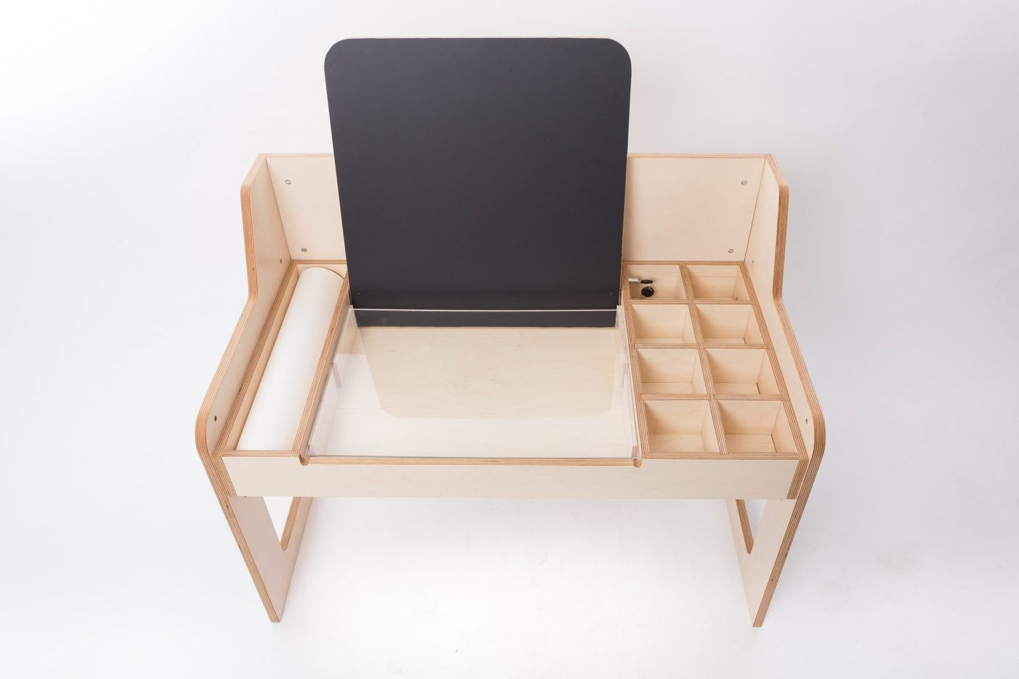 Angled view of Luula birch table with black easel and wooden support frame