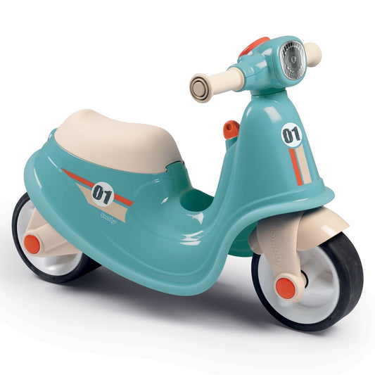Blue retro ride-on scooter with cream seat, handlebar, and white wheels with red accents