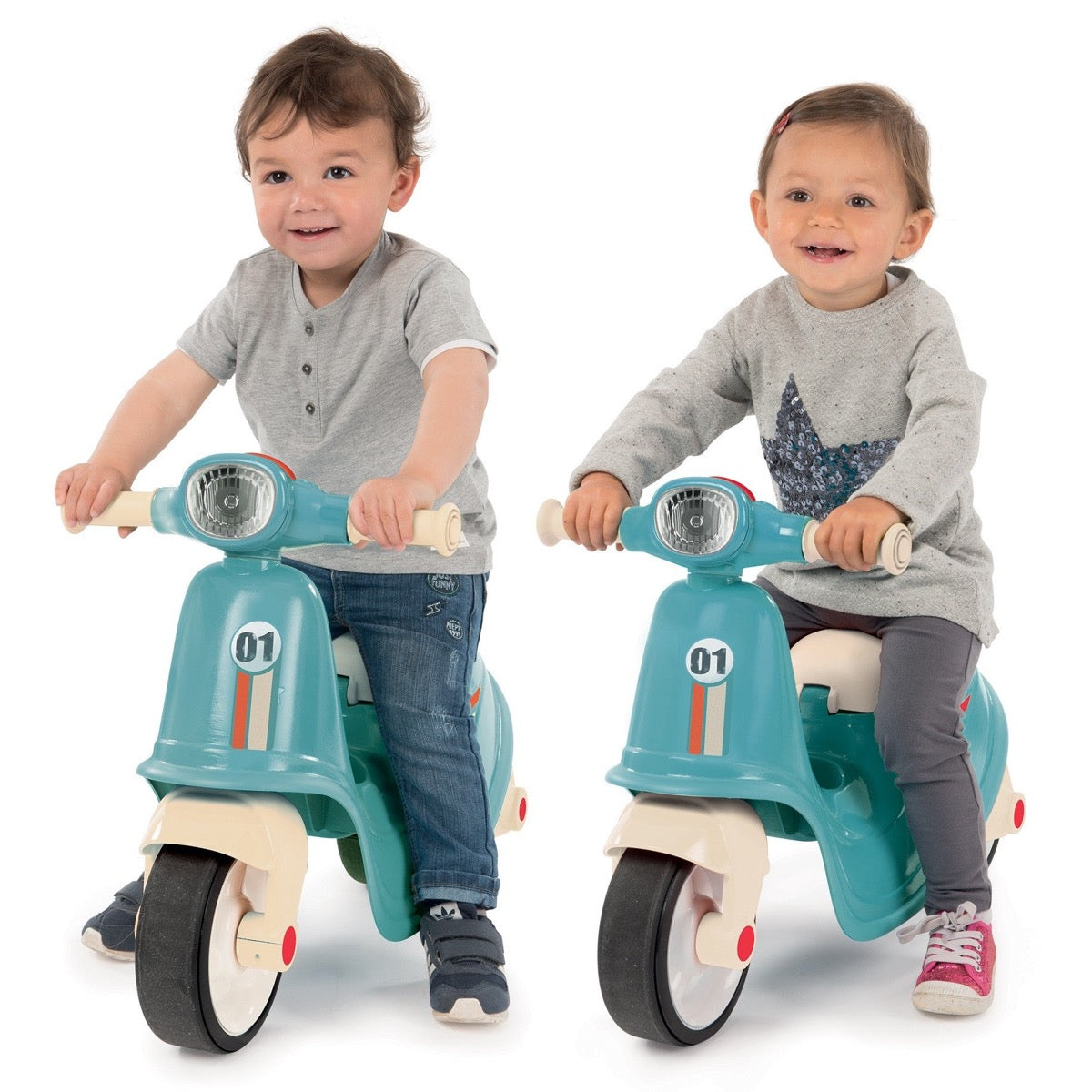 Two toddlers riding blue retro scooters outdoors, ages 18 months and up
