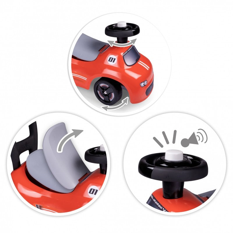 Close-up details of red ride-on car showing storage seat, horn, and steering wheel