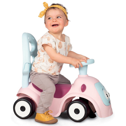 Toddler riding pink Maestro 3in1 with removable backrest and parental push handle