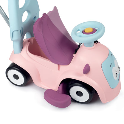 Top view of Maestro 3in1 pink ride-on showing removable canopy and steering wheel functionality