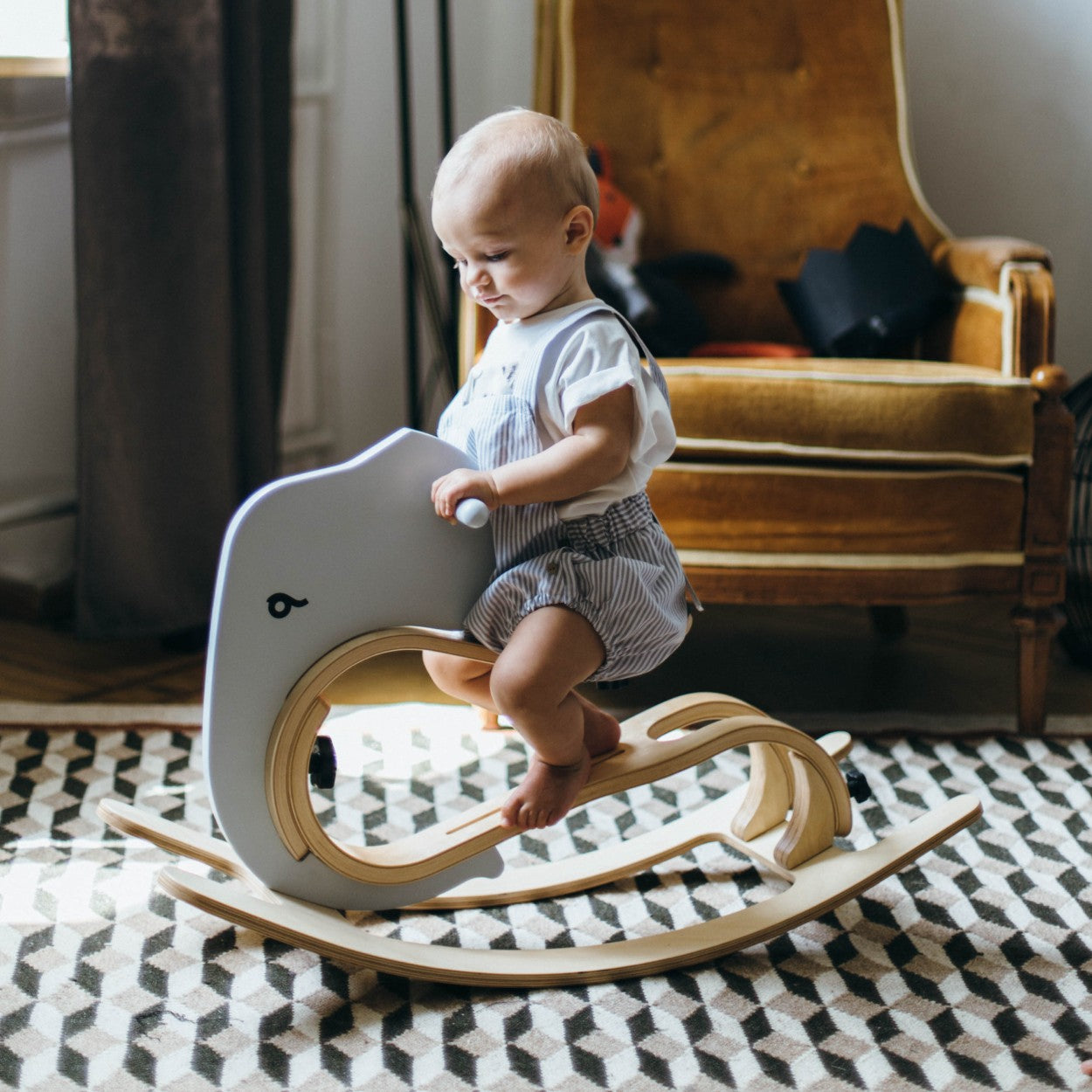 Baby riding leg&go rocking elephant with curved wooden rockers and white seat