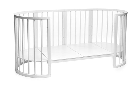 KOTTO OLIN round baby crib in white beech wood, front three-quarter view showing full crib structure