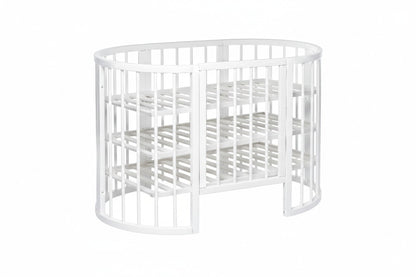 White round baby crib OLIN side view with wheels and open gate configuration for bedside use