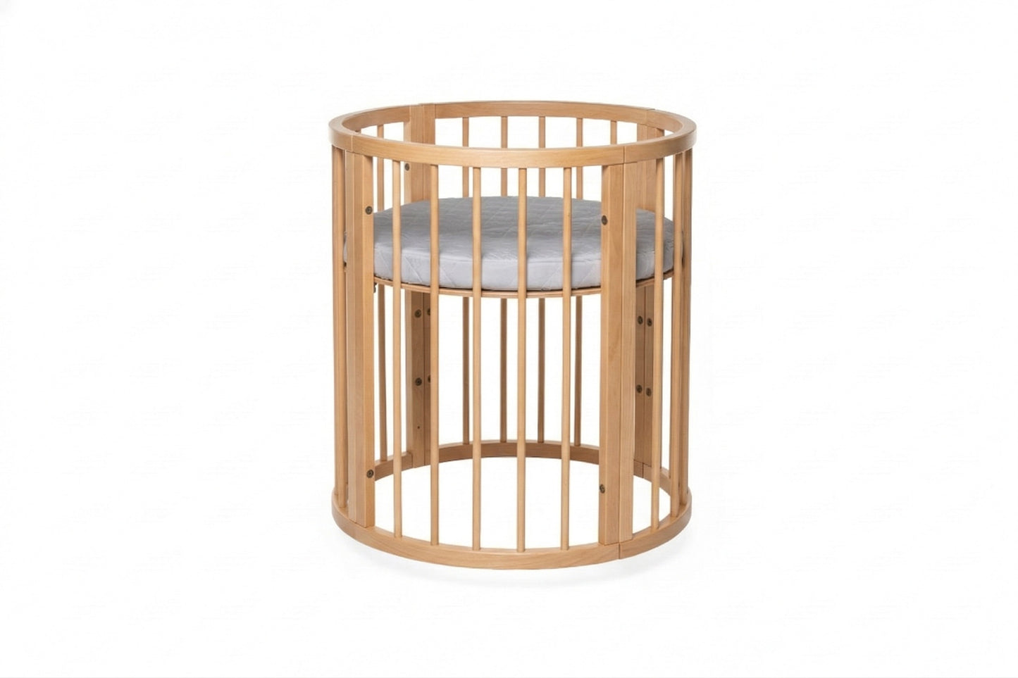 Round beechwood crib with removable side panel and white mattress