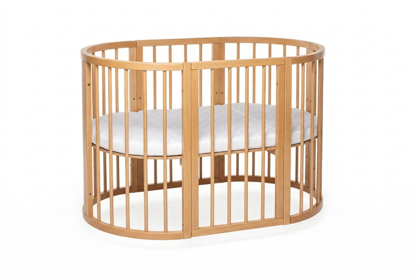 Round beech crib with one removable side open to function as bedside sleeper