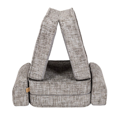 Moon grey modular sofa formed into tent or fort shape with cushions as supports and base