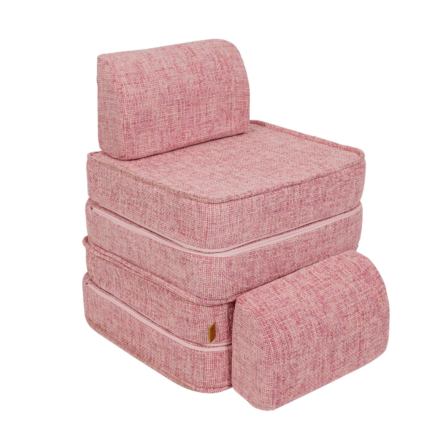 Stacked modular sofa cushions showing individual foam blocks in bubblegum pink