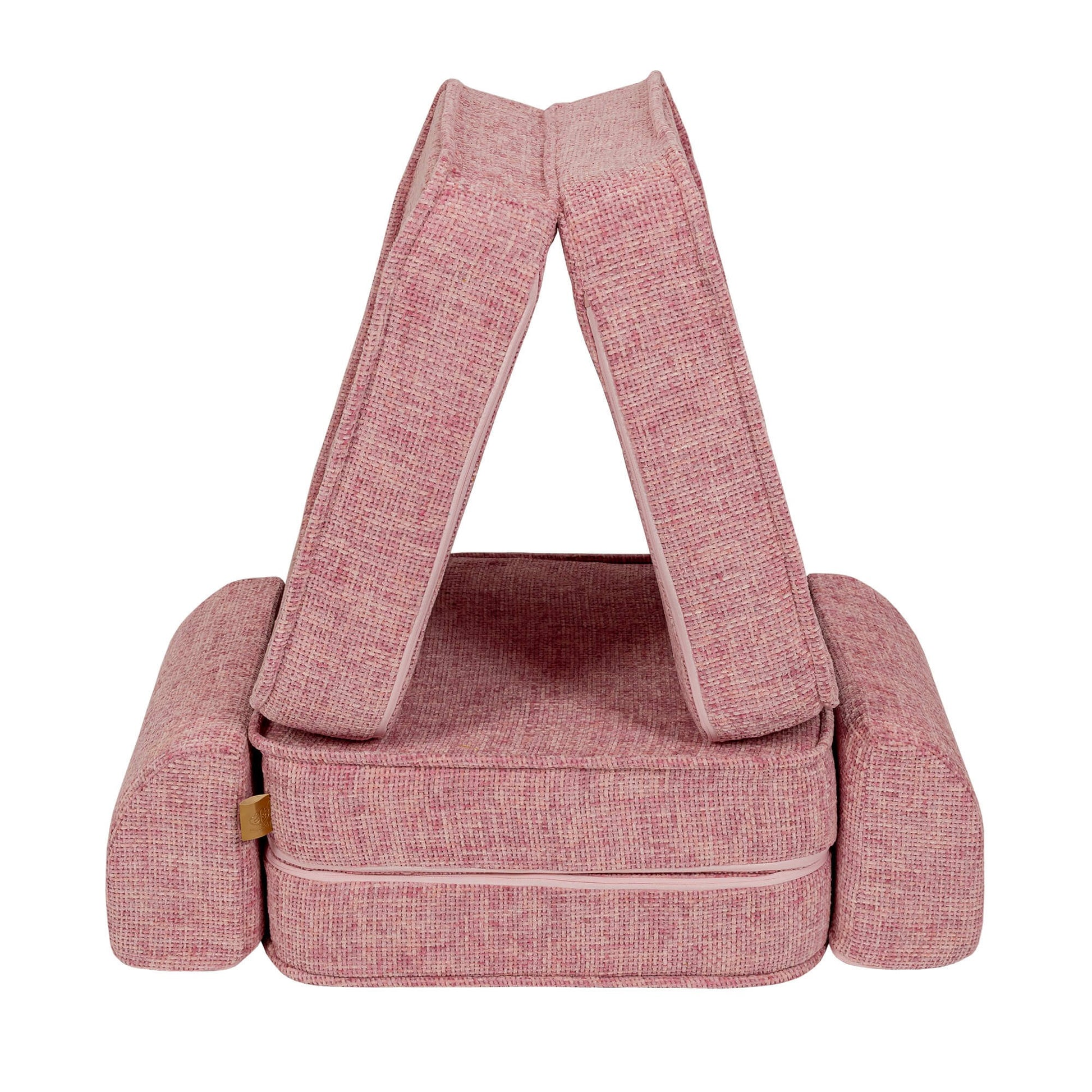 Bubblegum pink modular sofa with handle carrier straps for easy transport and storage