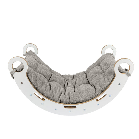 Snug Rocker top view with gray cushion pillow and four handle rings