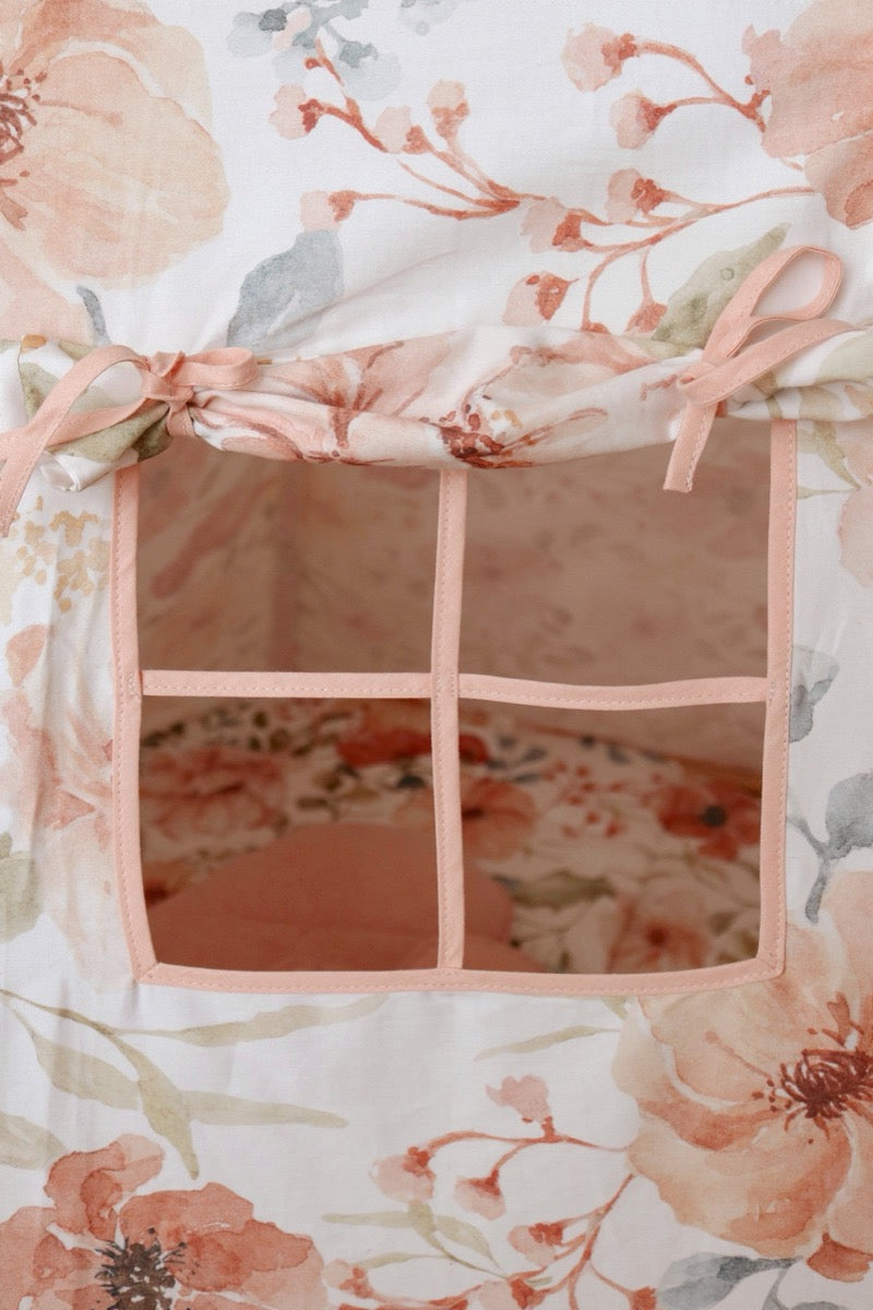 Teepee window with curtain showing interior pocket detail and floral pattern