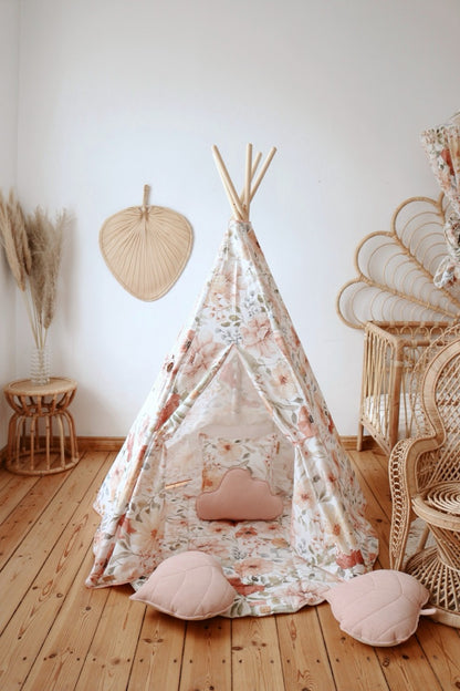 Flower Power teepee tent with interior visible and pink shell-shaped cushions