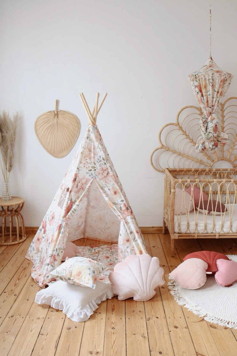 Flower Power teepee tent in nursery with mobile, crib, and woven accent pieces