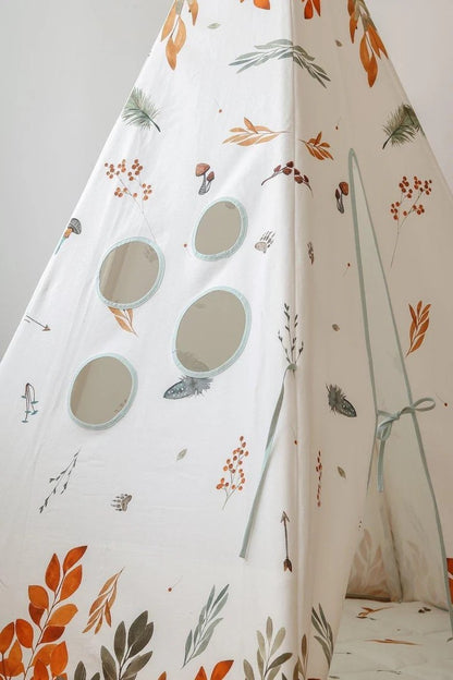 Detail of teepee side panel showing window cutouts and woodland leaf pattern