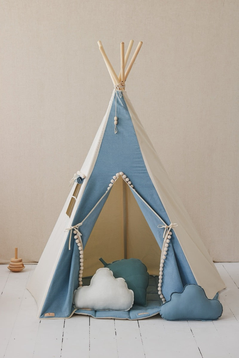 Jeans teepee tent interior with cloud-shaped cushion pillows and decorated roof lining