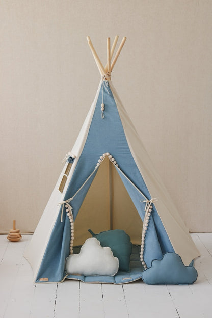 Jeans teepee tent interior with cloud-shaped cushion pillows and decorated roof lining