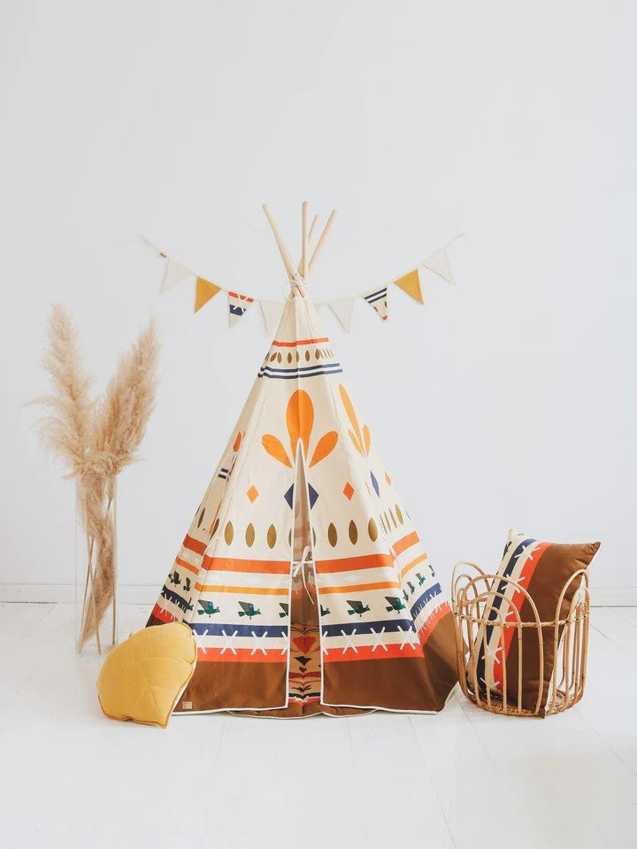 Front view of Native Vibe cotton teepee tent showing bold orange leaf and geometric tribal design with included mat