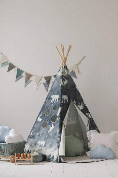 Night Sky teepee tent in styled room setting with storage basket, cloud decor, and wooden toys