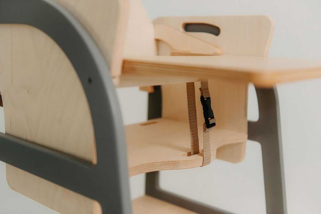 Natural wood kitchen tower paired with matching wooden table and chair set