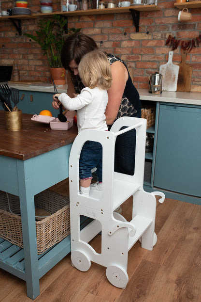 Family-scl Montessori step stool converted into desk for drawing and crafts