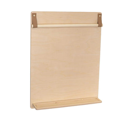 Wooden drawing board displaying blank white paper and pencil ledge shelf