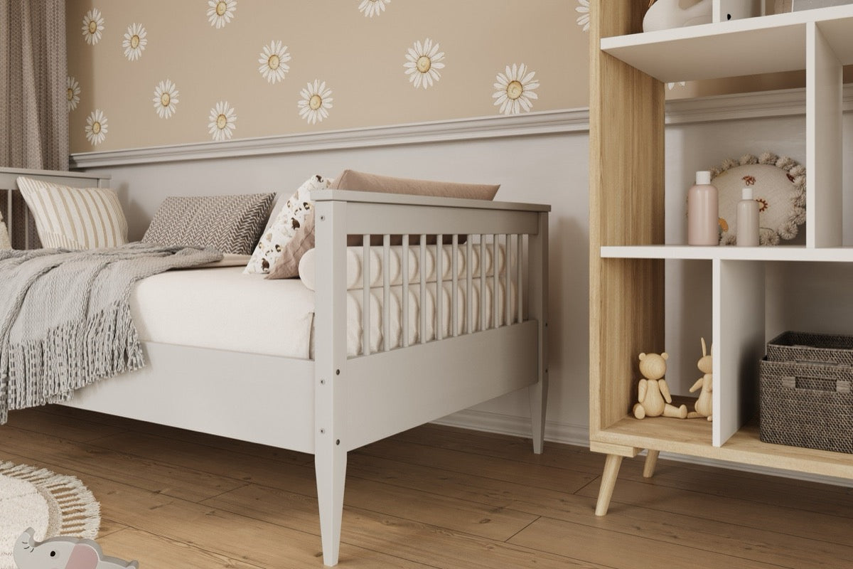 White finish Emilia kids bed with vertical slat design and tapered legs