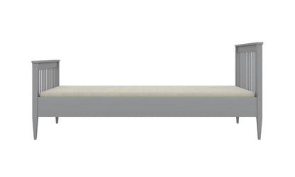 Gray Emilia wooden kids bed profile view with tapered legs and slat rails